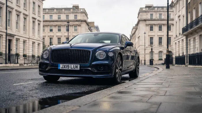 Dark blue Bentley Flying Spur for chauffeur car hire in Milton Keynes